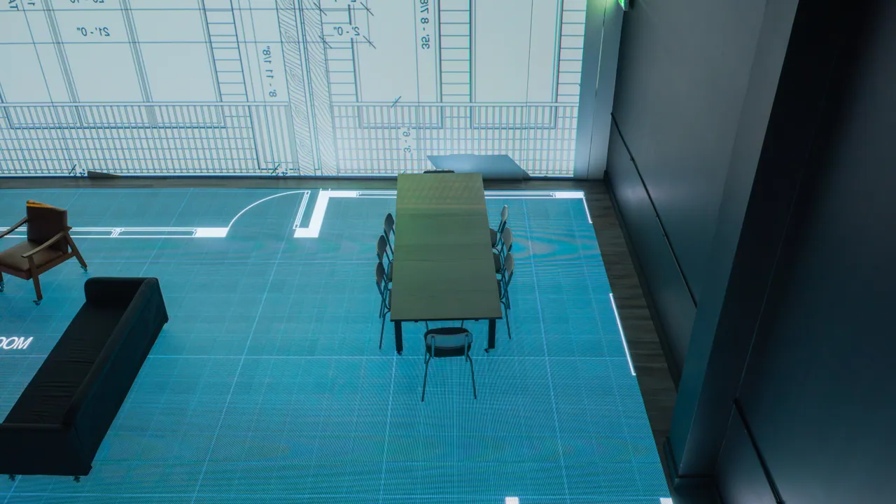 A dining table seen from above on the life-size floor plan