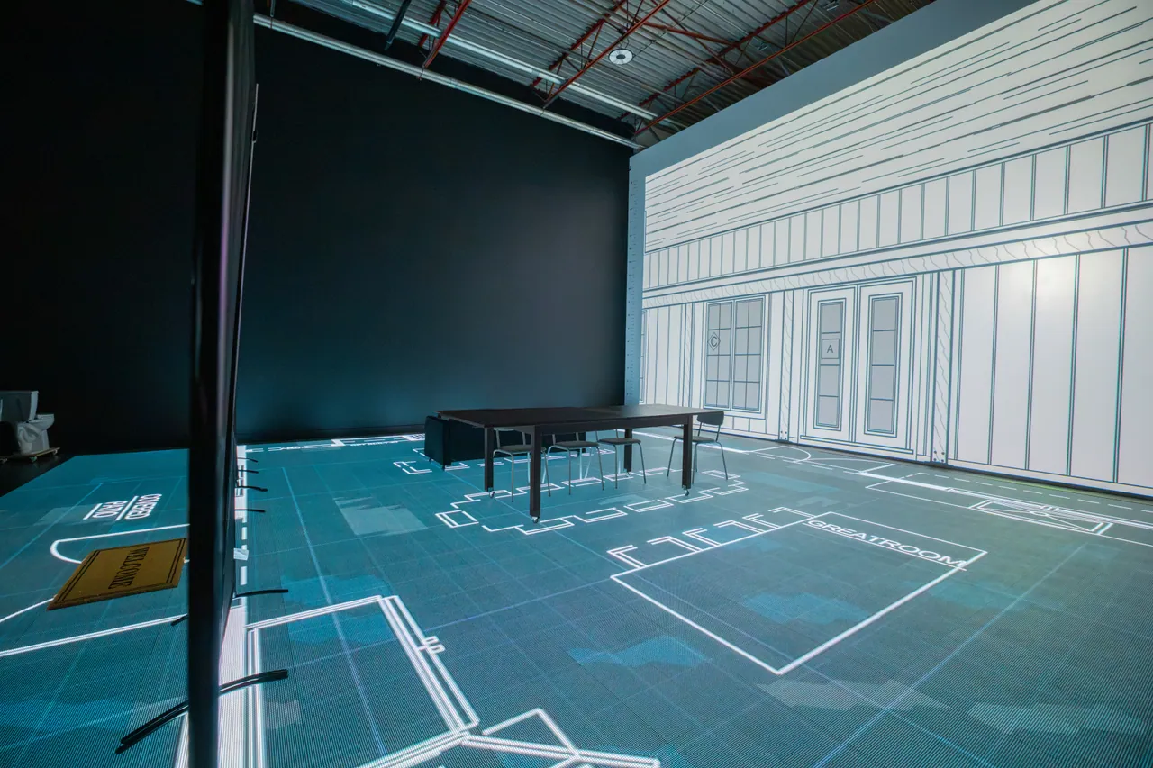 Movable walls and a dining table on the illuminated floor plan